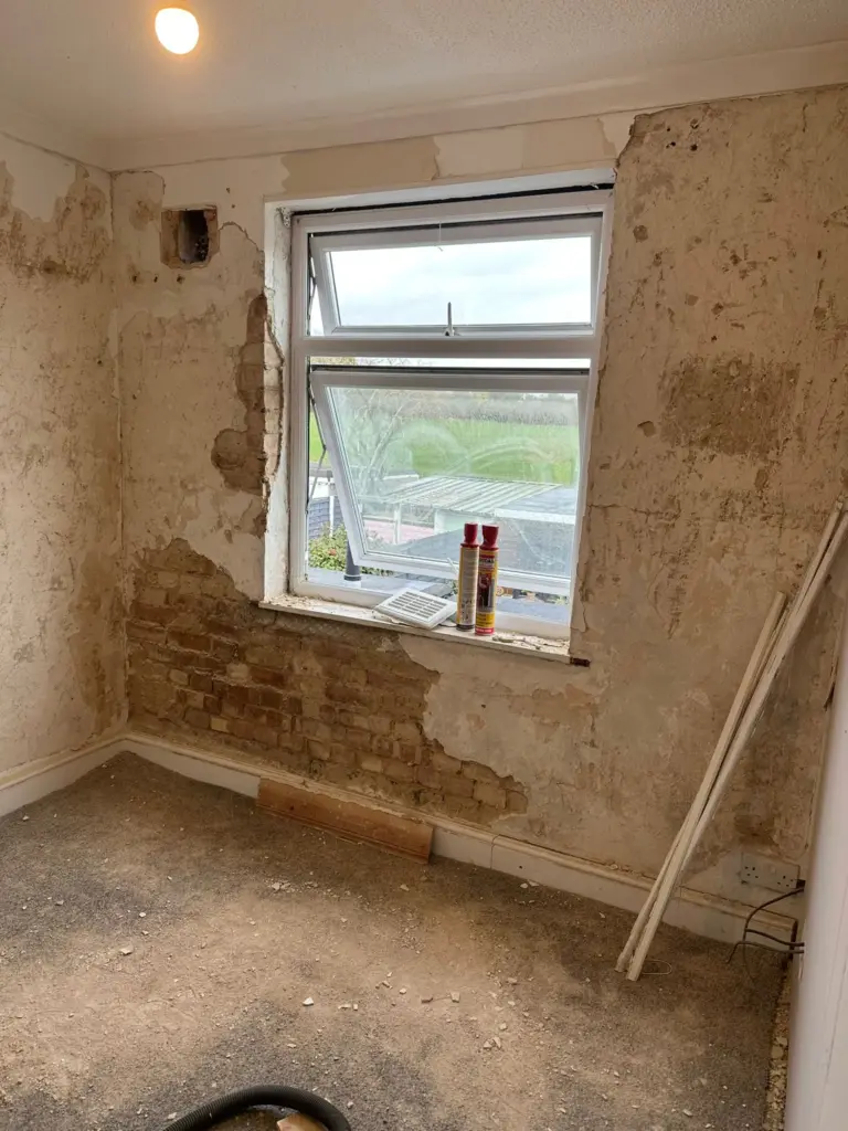 bedroom-wall-stripped-for-plaster-building-works-london-summit-services-london-ltd